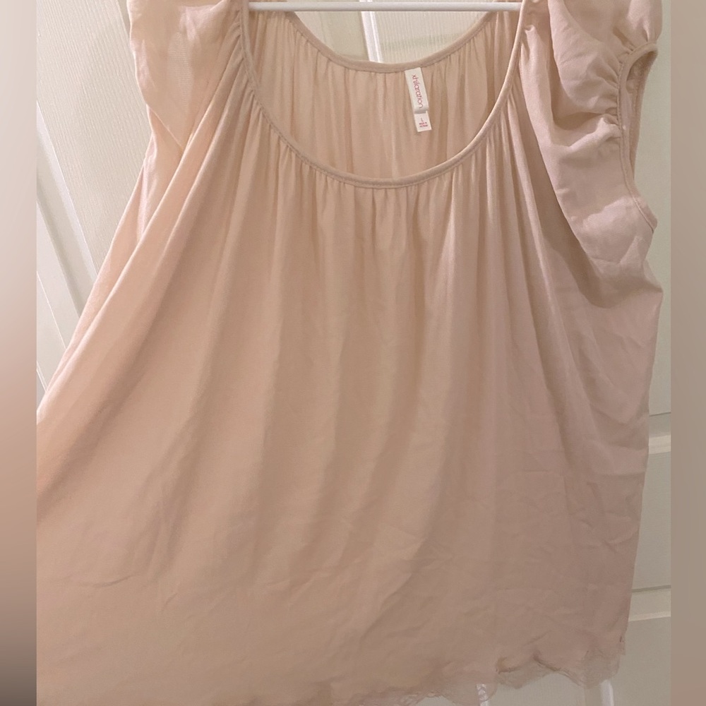 Peach shear babydoll top with lace detail at bottom . Never worn